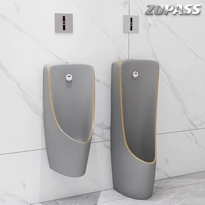 La una pieza detrás perfora el cuenco montado en la pared Grey Gold Color del orinal