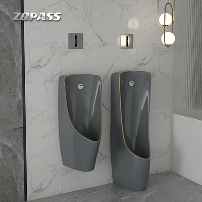 La una pieza detrás perfora el cuenco montado en la pared Grey Gold Color del orinal