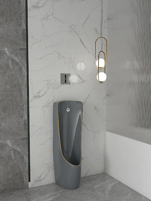 La una pieza detrás perfora el cuenco montado en la pared Grey Gold Color del orinal