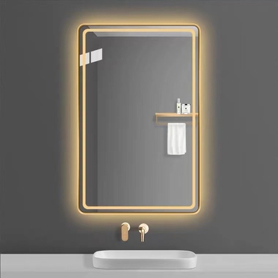 El espejo Frameless rectangular de encargo Smart del cuarto de baño hizo excursionismo la pared del LED